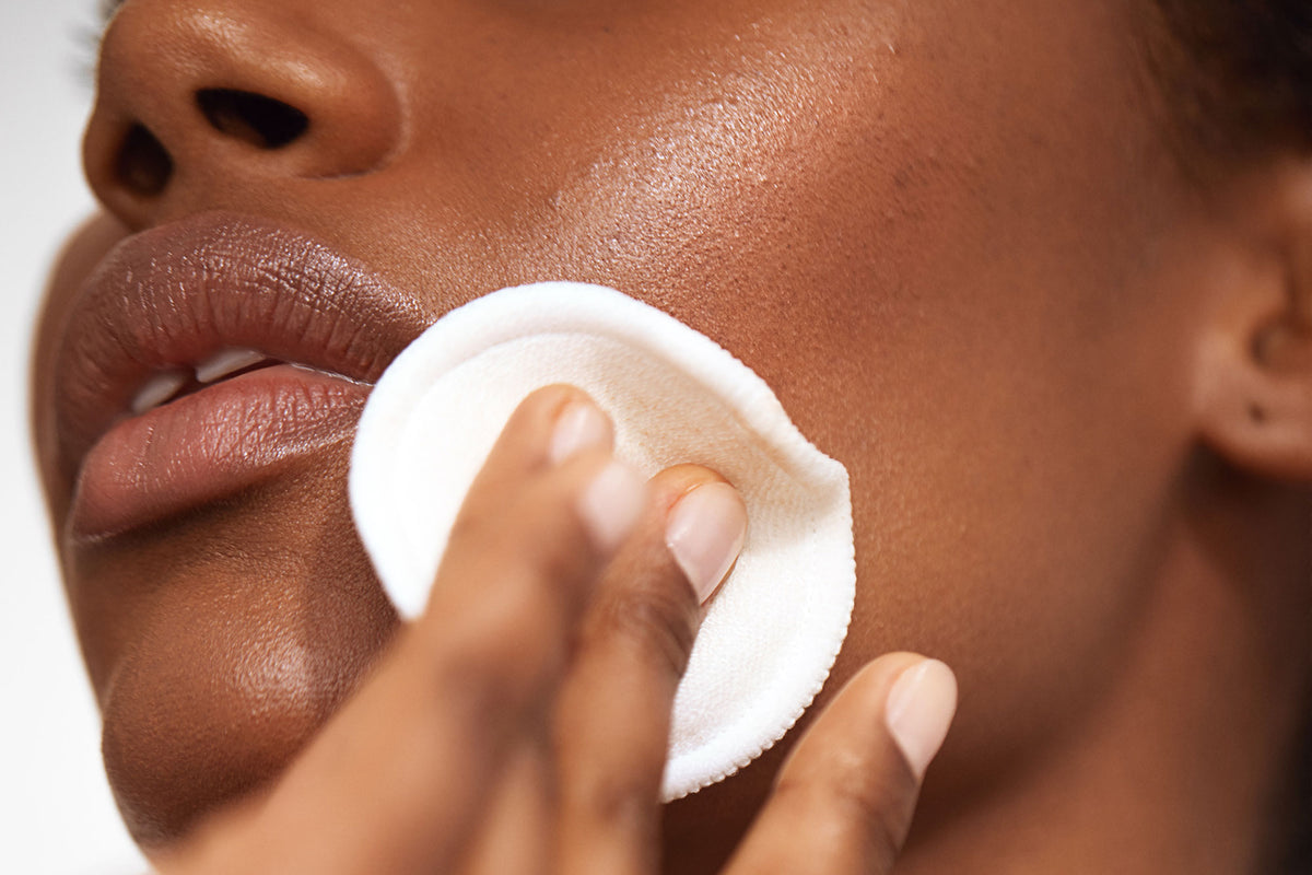Person Using Toner The Benefits of Using a Toner, According to a Derm